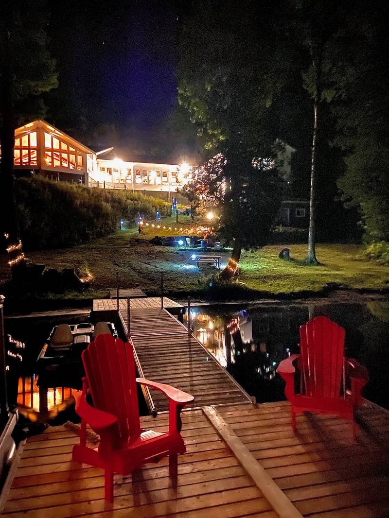 Dock and Manor lit up at night
