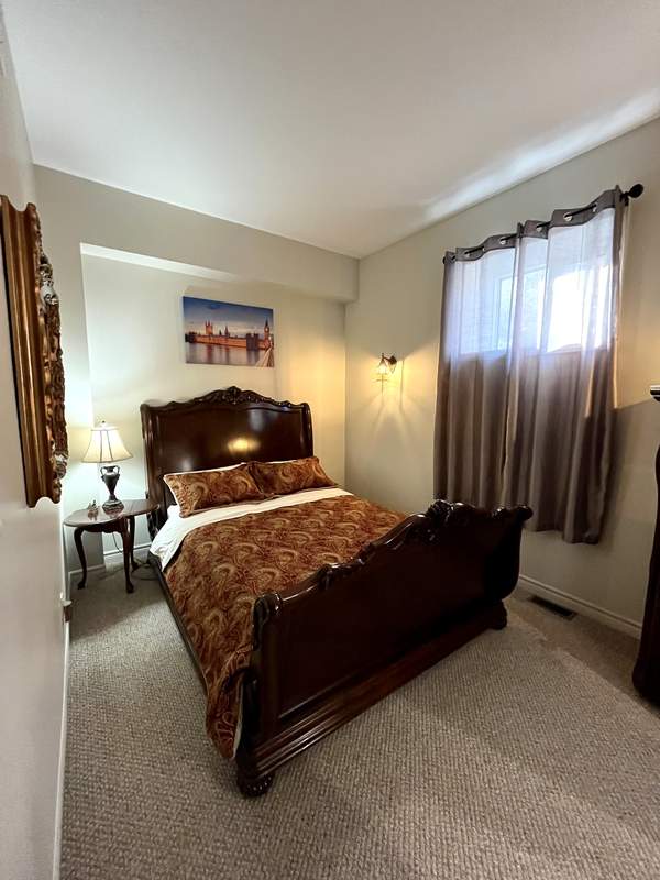Room 5 — French elegant antique queen bed with adjoining ensuite