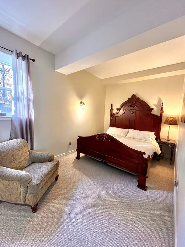Room 6 — Elegant heirloom mahogany king bed with adjoining ensuite