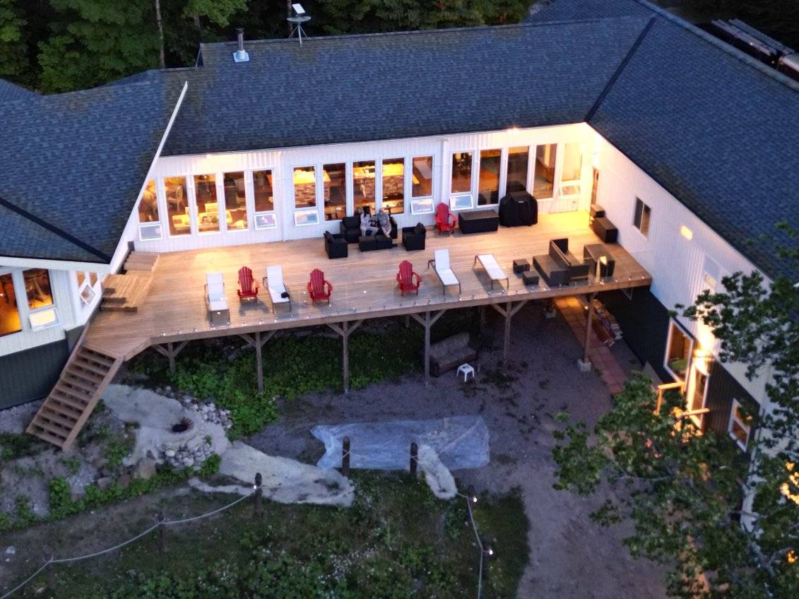Spring Lake Manor deck and lakeside at dusk